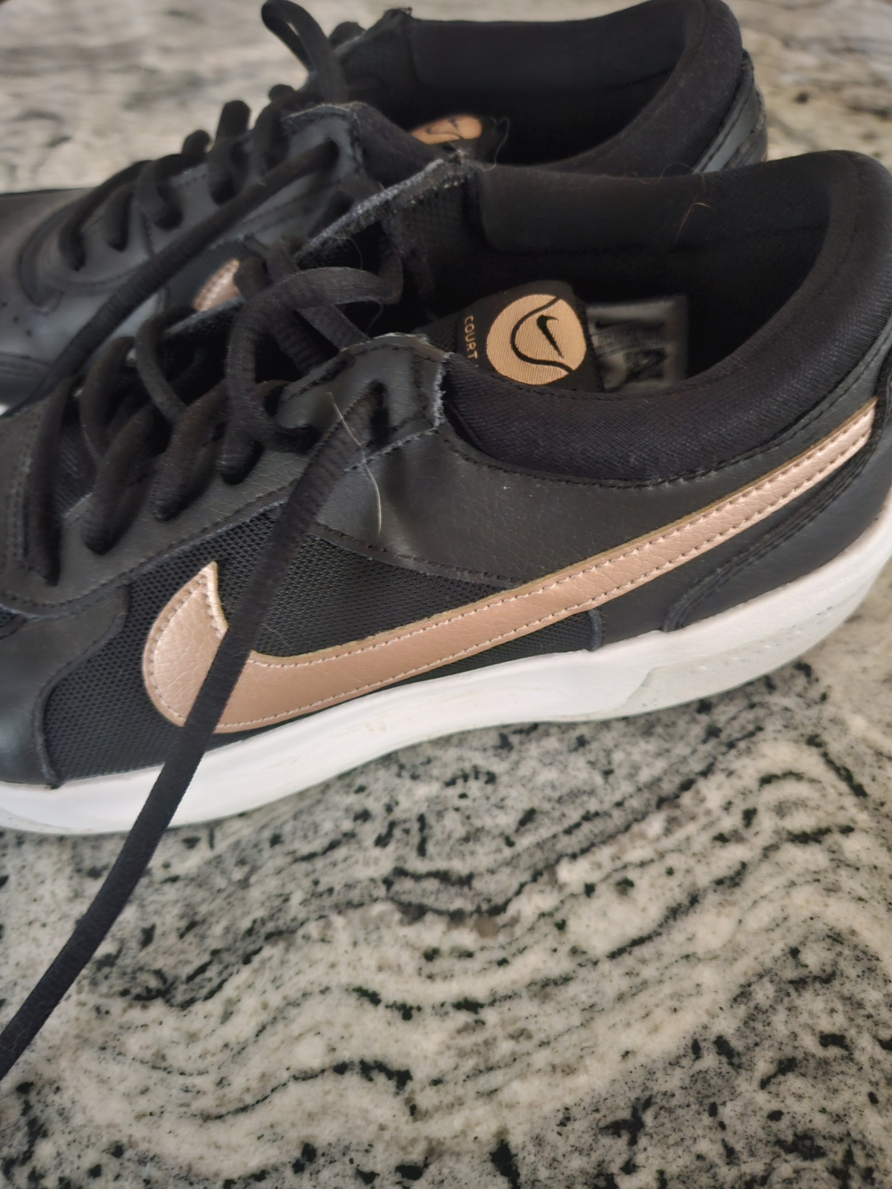 Nike Women’s Black Sneakers with Rose Gold Swoosh